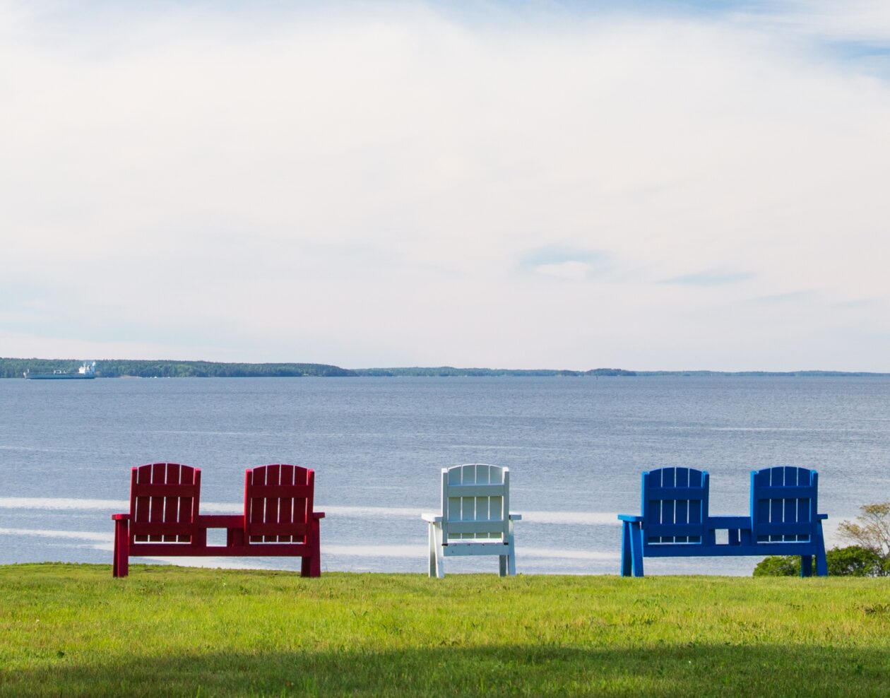 Water views with Adirondack chairs