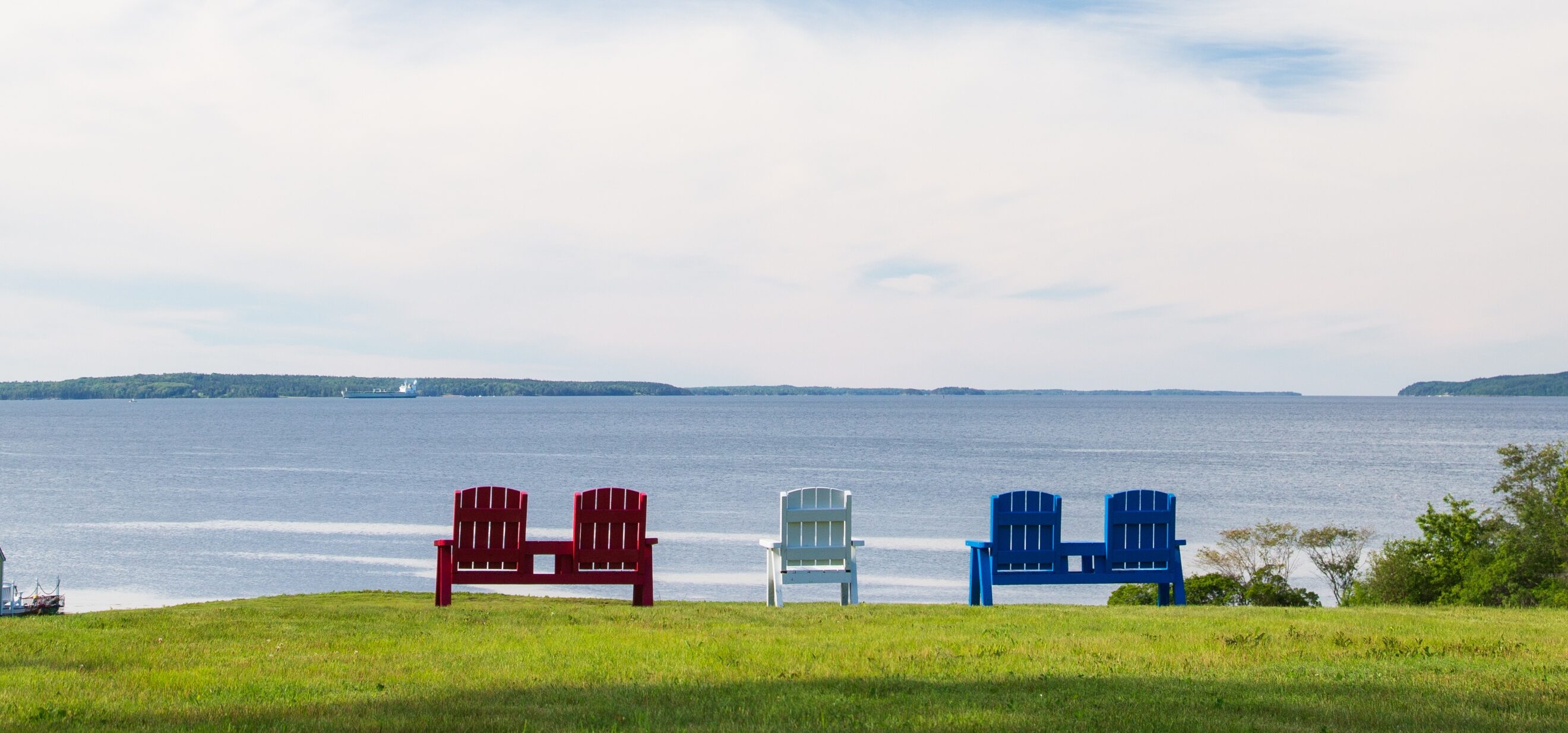 Water views with Adirondack chairs
